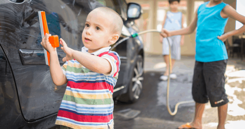 children washing a car