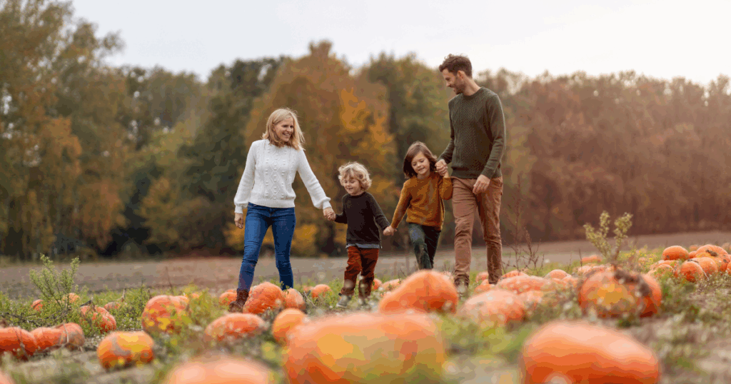 family in a pumpkin patch