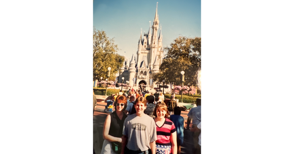 Our family at Disney World after saving and paying cash for a memorable Florida vacation.