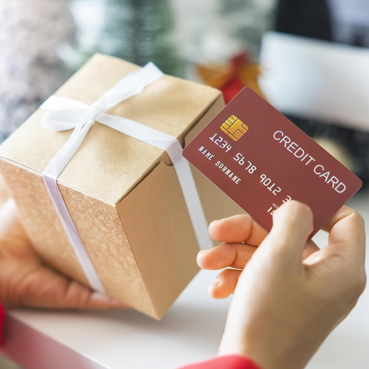 Christmas gift and credit card representing intentional holiday spending
